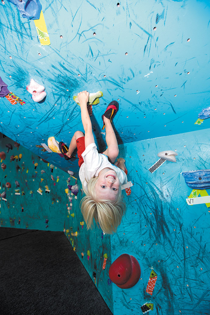 The gym attracts climbers of all ages, including Ridgely's 5-year-old son, Ronin ANTHONY CONSILLIO PHOTOS