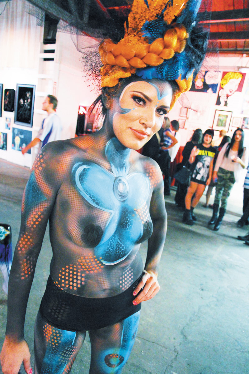 In addition to drinks and free pancakes, The Pancakes & Booze Art Show also features music, art and body painting, as seen here PHOTOS COURTESY PANCAKES & BOOZE