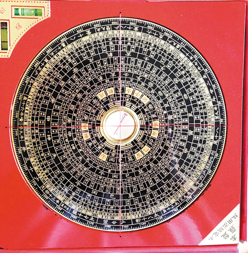 Lum's feng shui compass helps him identify different energies inside a space PHOTOS FROM ALAN LUM