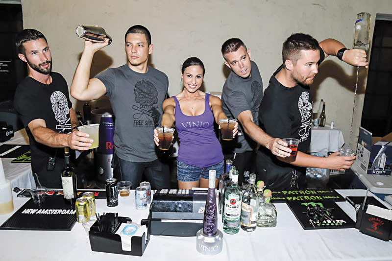 Free Spirits bartenders shaking things up: (from left) Duncan Kamakana, Kanani Ching, AJ Austin and Collin Lewis