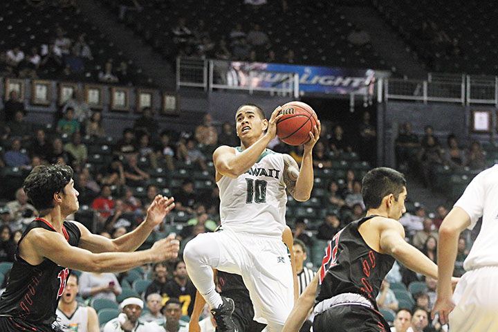 Dyrbe Enos logged five minutes of play time in UH's Dec. 8, 2015, victory against UH-Hilo. He scored the final points of the 86-67 win. PHOTO COURTESY HAWAII ATHLETICS