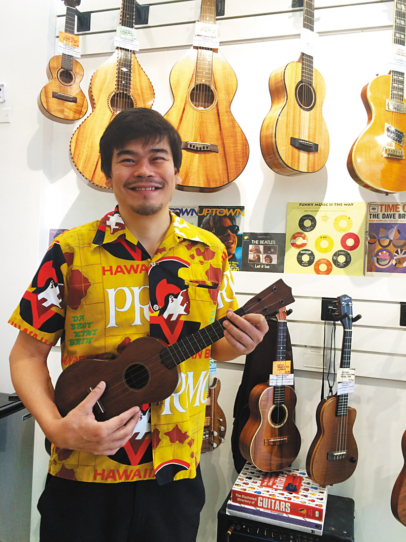 Tyler Gilman, owner of The Ukulele Store, celebrates his shop's opening with a kanikapila from 4 to 6 p.m. today (June 3). NICOLE KATO PHOTO