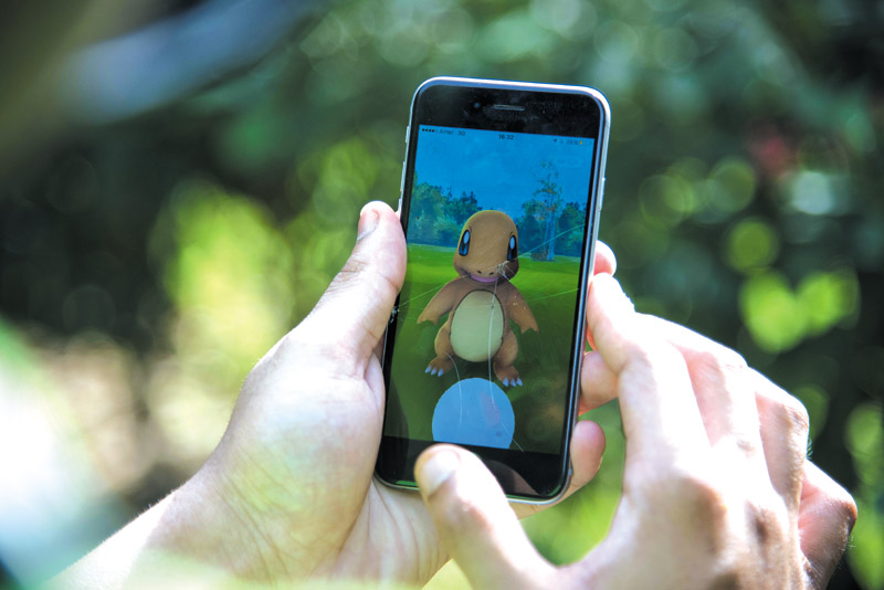 The Pokemon craze from the ‘90s has returned nearly two decades later in the form of app-based game Pokemon Go (AP PHOTO/THOMAS CYTRYNOW)