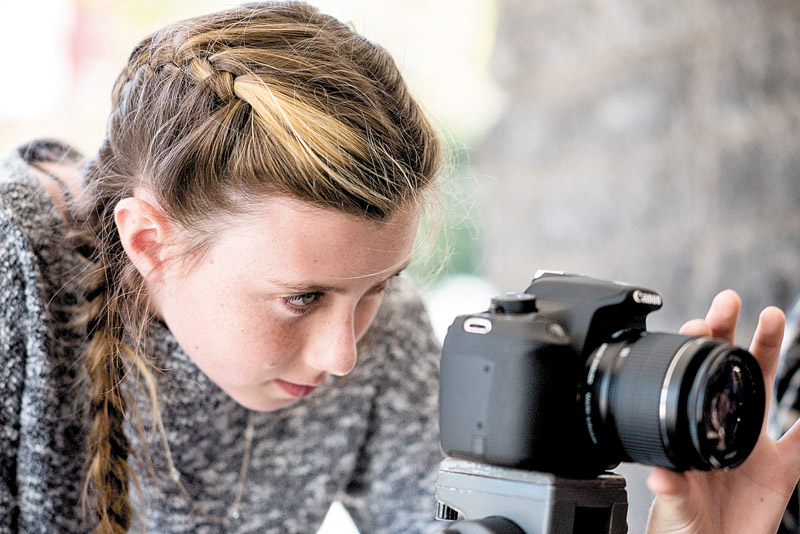 Jade Brier sets up her shot during a recent Basic Reel Camp class, which teaches students everything from storyboarding to editing VALERIE NARTE PHOTO 