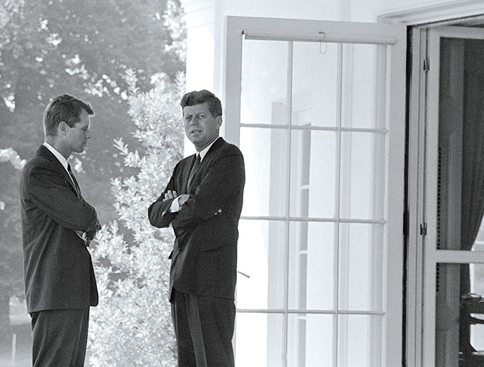 The author's current historical obsession is the Kennedy family. Pictured here are Robert F. and John F. Kennedy in 1962, during the Cuban Missile Crisis AP PHOTO