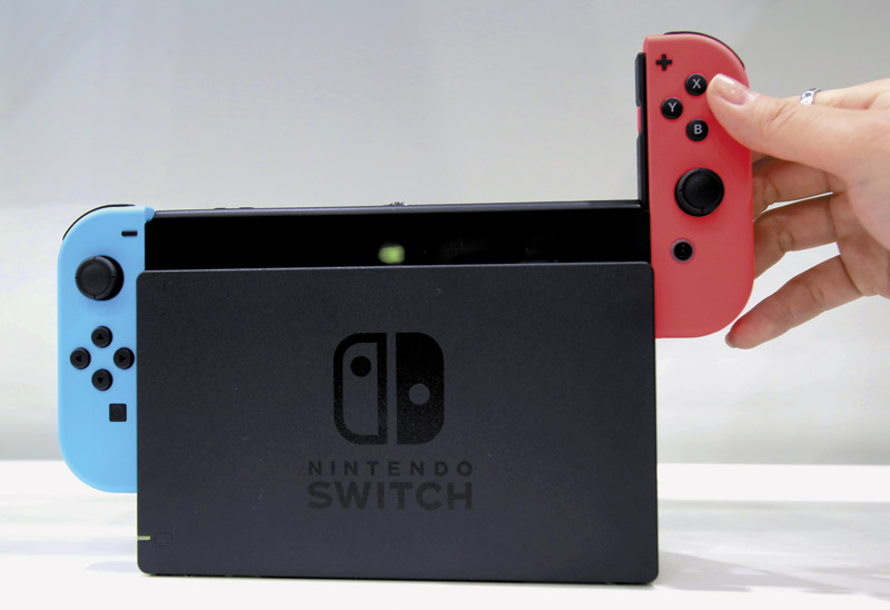 The Nintendo Switch is set to be released March 3 AP PHOTO 