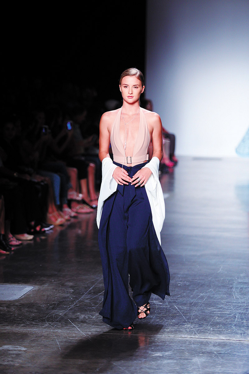 A nude wrap around one piece with navy wrap pant and pleated kimono; accessories by M33ms